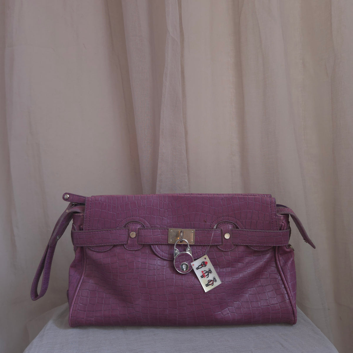 'firking' clotch bag